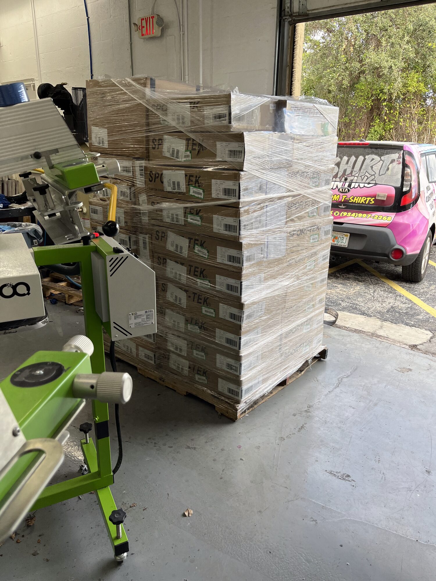 Pallet of completed orders ready to ship under client labels